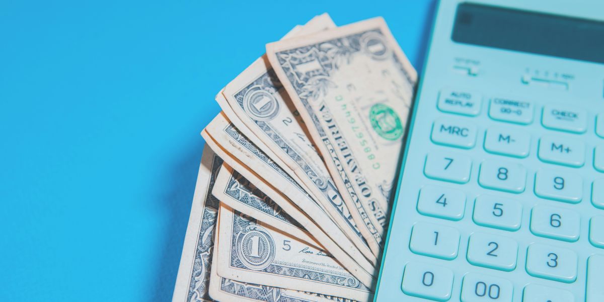 calculator and dollars